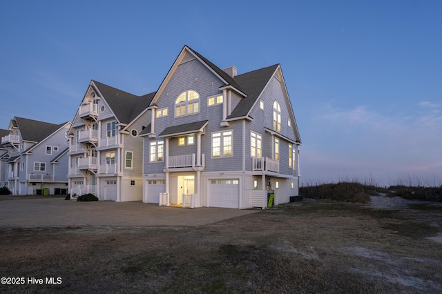 view of front of home with driveway and an attached garage