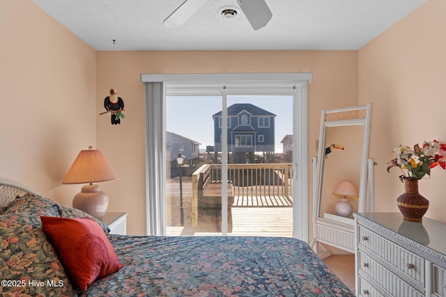 bedroom with access to exterior and ceiling fan