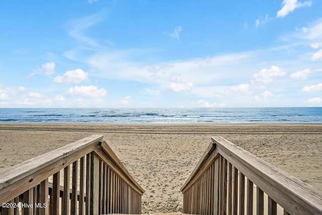 view of water feature with a beach view