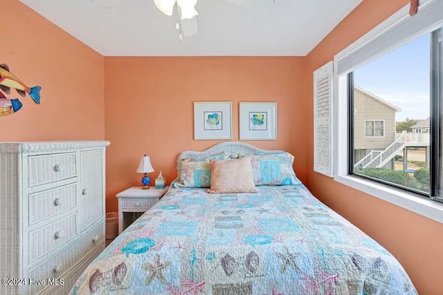 bedroom featuring ceiling fan