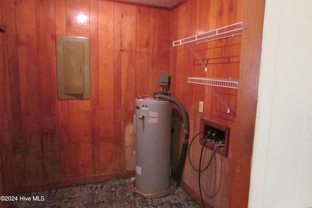 utilities with electric panel and gas water heater