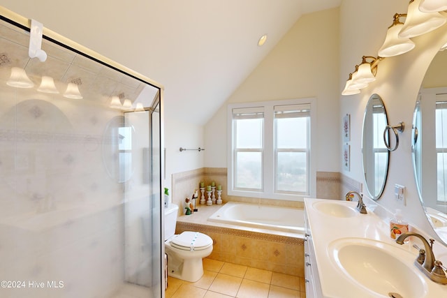 full bathroom with tile patterned floors, toilet, lofted ceiling, and independent shower and bath