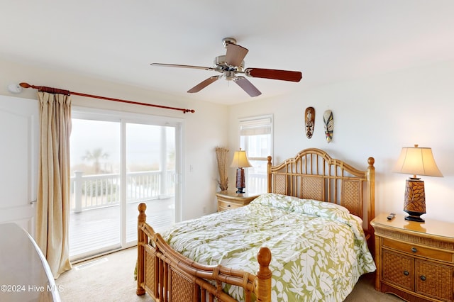 carpeted bedroom with access to exterior and ceiling fan