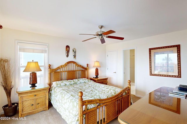 bedroom with light carpet, a closet, and ceiling fan