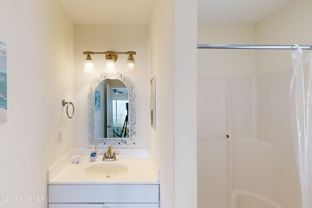 bathroom featuring vanity and walk in shower