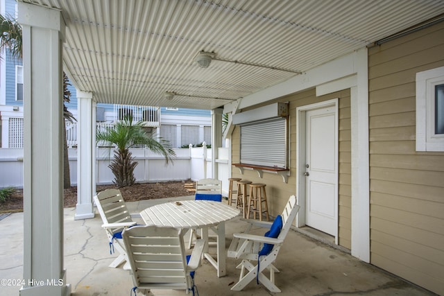 view of patio / terrace featuring exterior bar