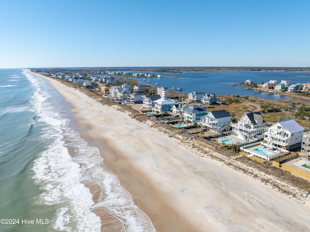 aerial view with a view of the beach and a water view