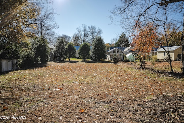 view of yard with fence