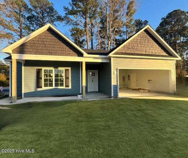 view of front of house with a porch and a garage