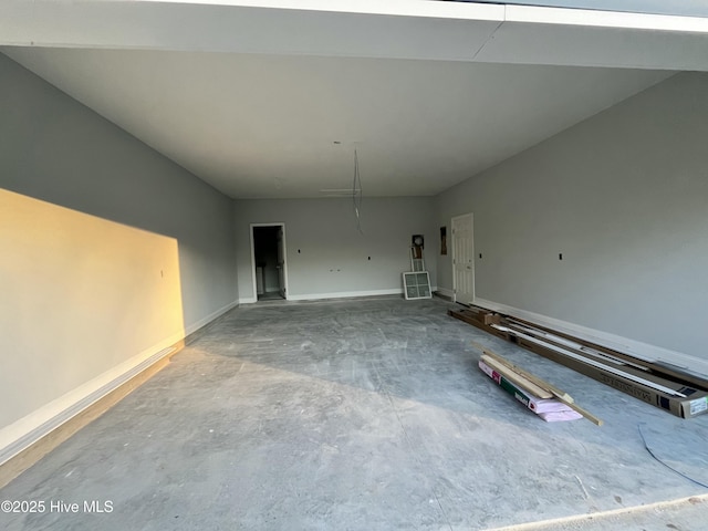 garage featuring baseboards