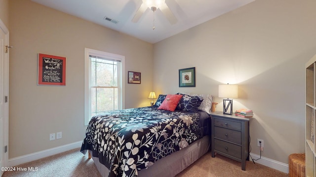 carpeted bedroom featuring ceiling fan