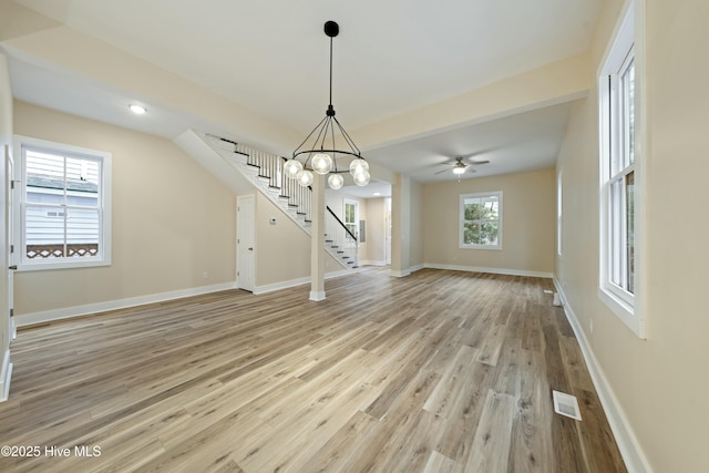 interior space featuring a chandelier and light wood-type flooring