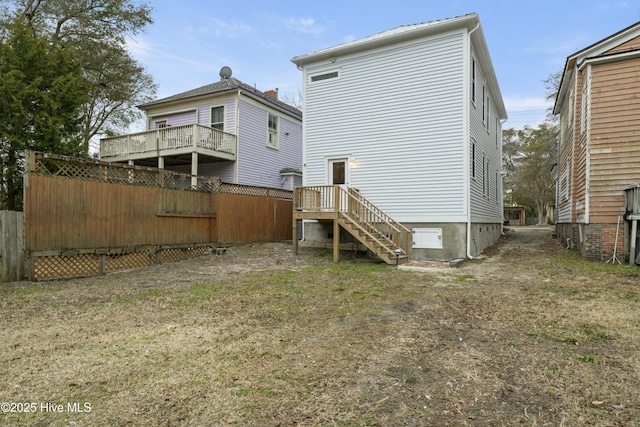 back of house with a yard