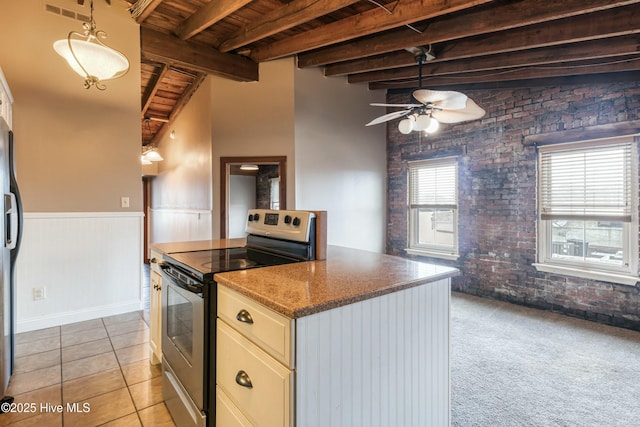 kitchen featuring decorative light fixtures, stainless steel electric range, wooden ceiling, beamed ceiling, and brick wall