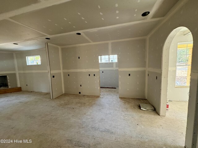 unfurnished living room featuring french doors