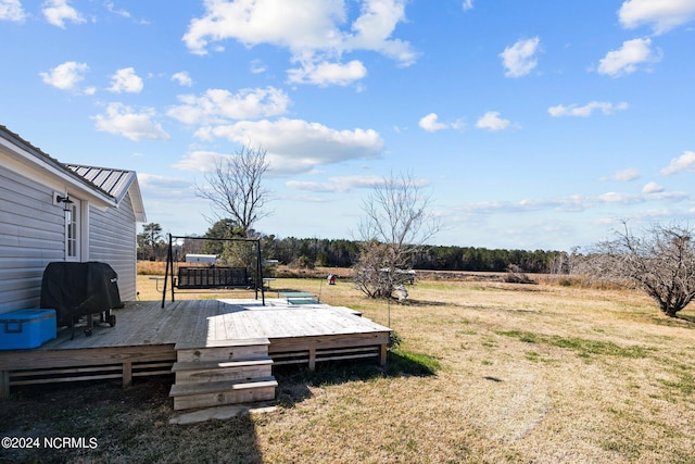 view of yard with a deck