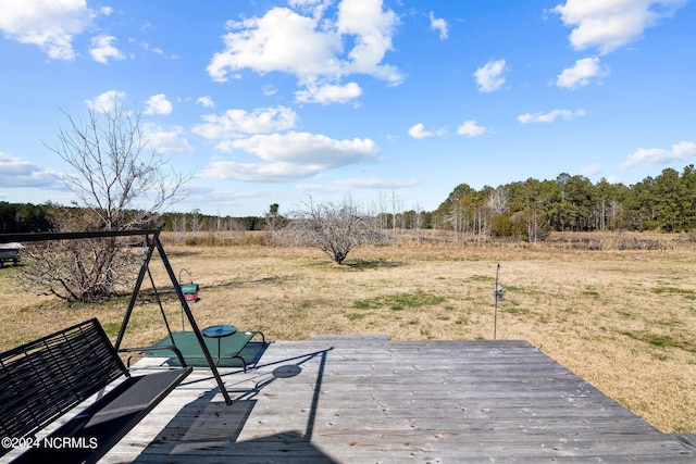 deck featuring a lawn