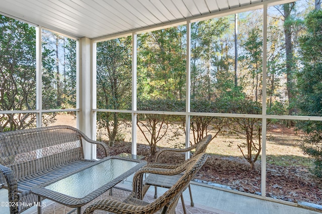 unfurnished sunroom featuring a healthy amount of sunlight