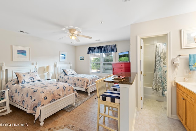 bedroom featuring ceiling fan and light hardwood / wood-style floors