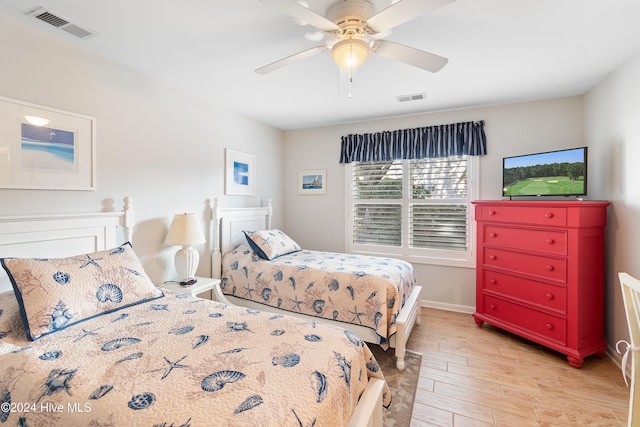 bedroom featuring ceiling fan and light wood-type flooring