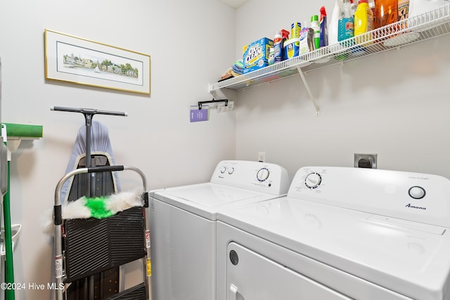 washroom with washer and dryer