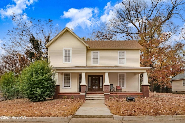 view of property with covered porch