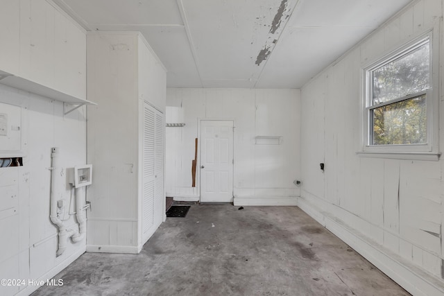 garage with wood walls