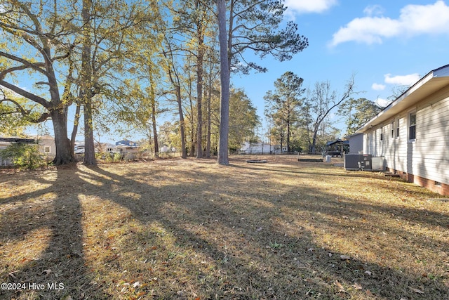 view of yard featuring central AC