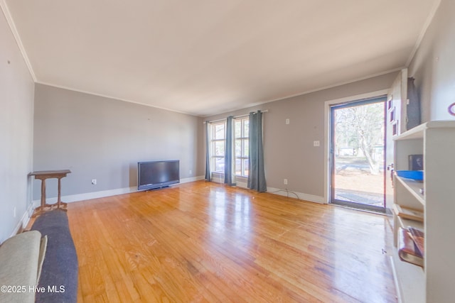 living room featuring crown molding and hardwood / wood-style floors