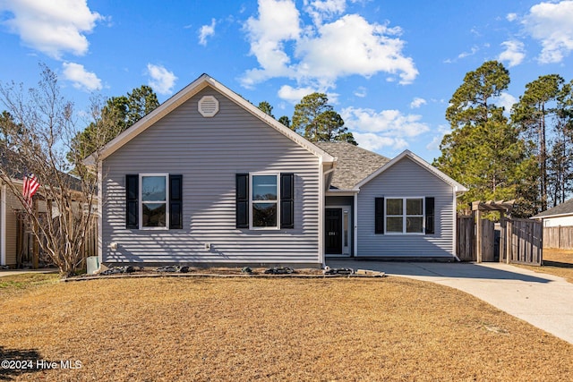 view of front of home with a front yard