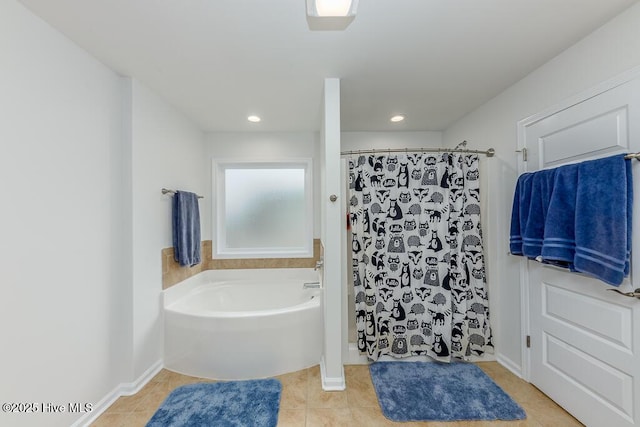 bathroom featuring tile patterned floors and independent shower and bath