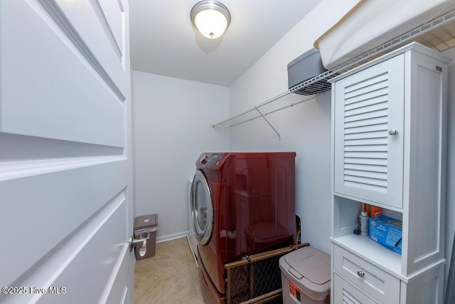 washroom featuring independent washer and dryer