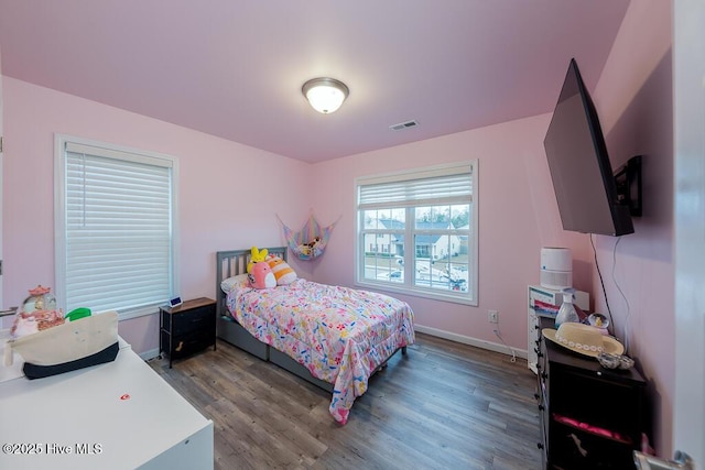 bedroom featuring hardwood / wood-style flooring