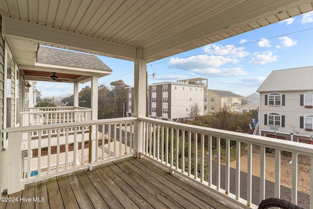 wooden terrace with ceiling fan