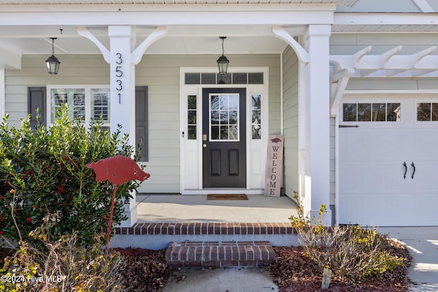 entrance to property with a porch