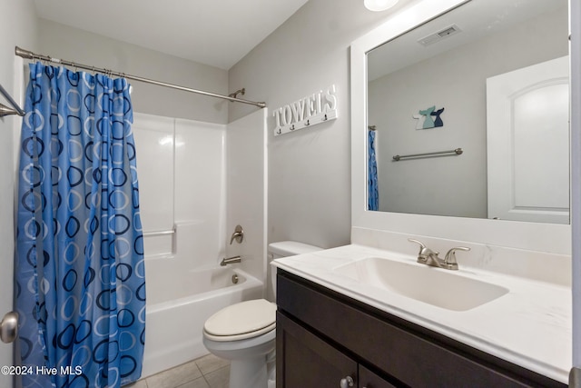 full bathroom featuring tile patterned floors, vanity, toilet, and shower / bathtub combination with curtain