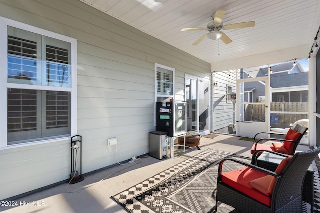 exterior space with ceiling fan