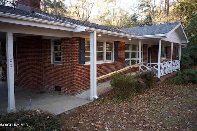 view of home's exterior featuring a porch