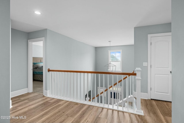 corridor featuring light hardwood / wood-style flooring