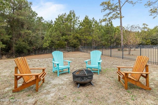 view of patio with an outdoor fire pit