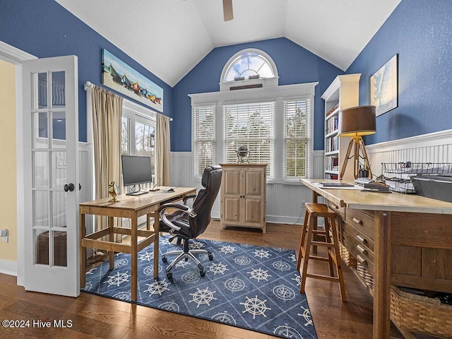 office space featuring dark hardwood / wood-style floors, vaulted ceiling, and ceiling fan