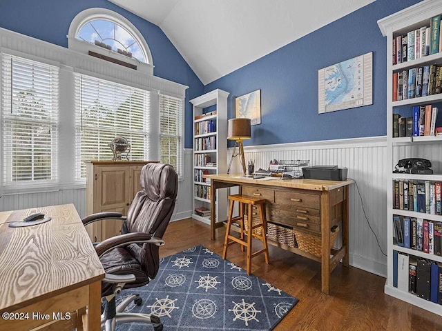 office area with built in features, dark hardwood / wood-style floors, and lofted ceiling