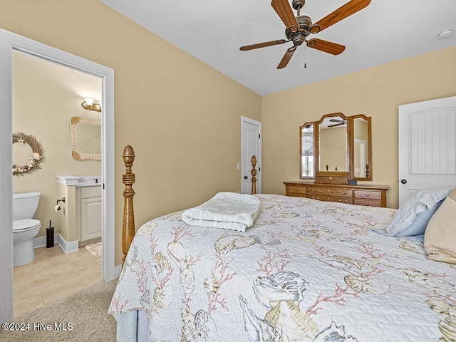 bedroom with connected bathroom and ceiling fan