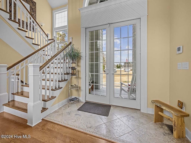 foyer entrance featuring a high ceiling