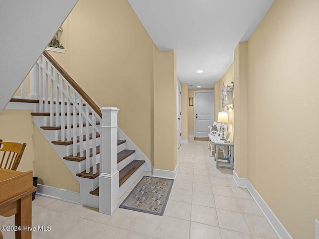 staircase with tile patterned flooring