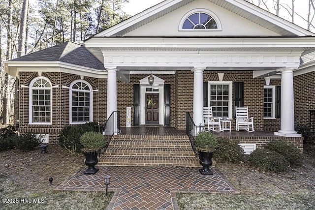 property entrance featuring covered porch