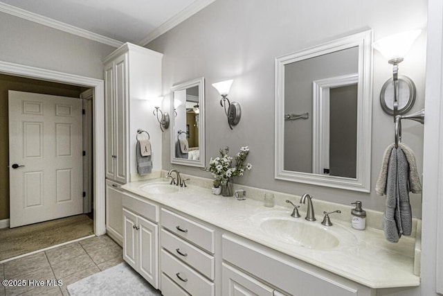 bathroom featuring ornamental molding, tile patterned floors, and vanity