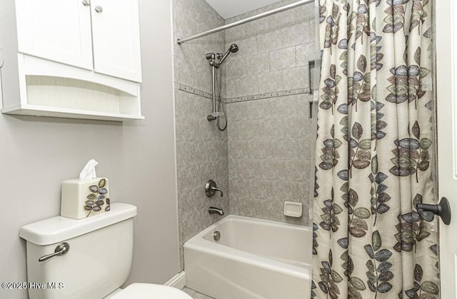 bathroom featuring toilet and shower / bath combo