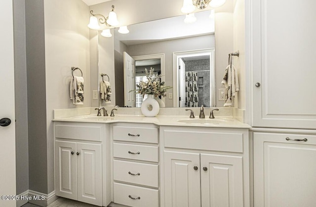 bathroom featuring vanity and a shower with curtain