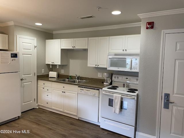 kitchen with white appliances, crown molding, sink, dark hardwood / wood-style flooring, and white cabinetry